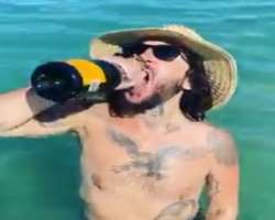 Mickey Avalon consuming alcohol